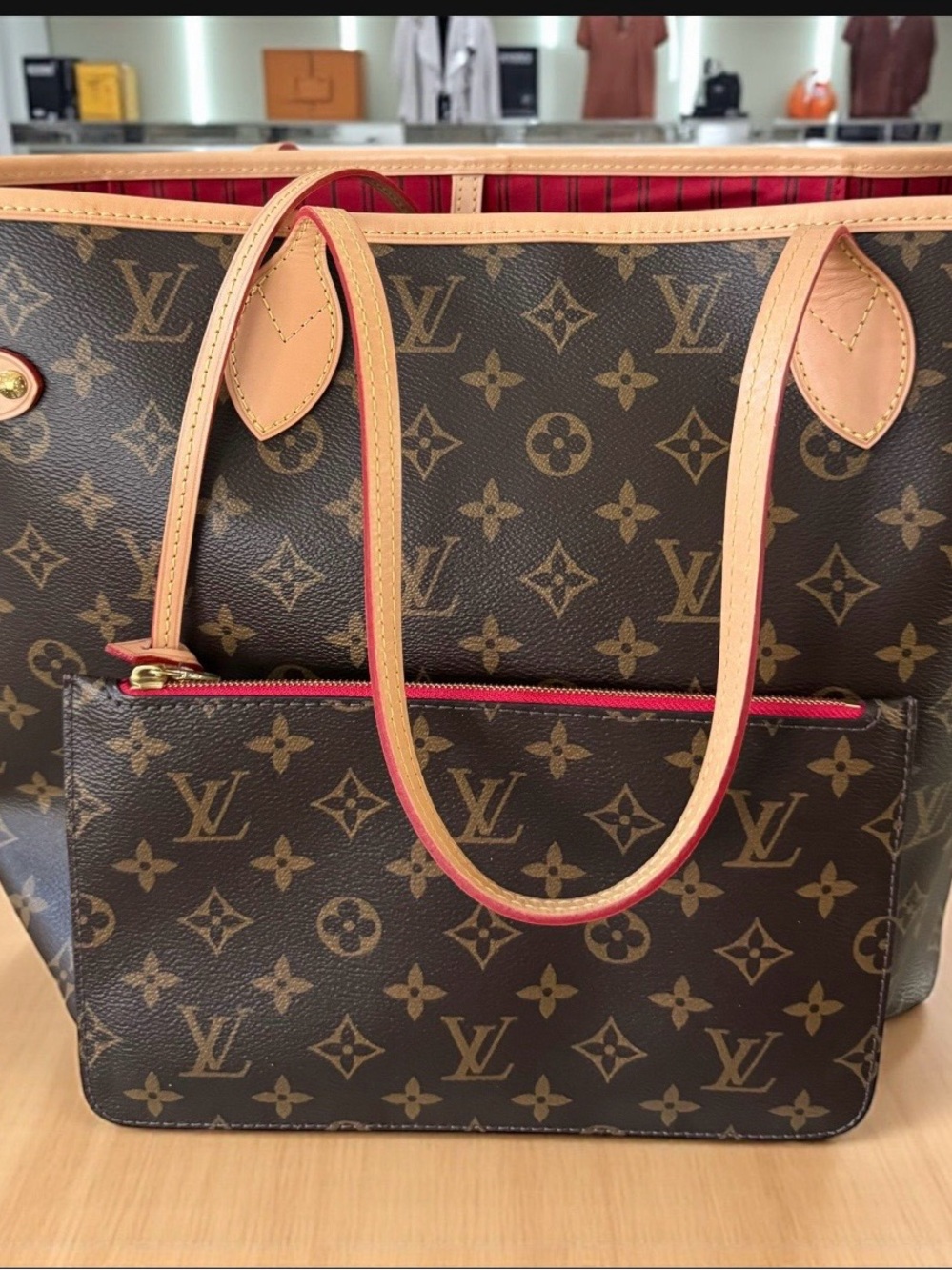 Louis Vuitton Monogram Neverfull Tote in Brown with Red Trim